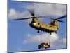 A U.S. Army CH-47 Chinook Helicopter Transports a Humvee-Stocktrek Images-Mounted Premium Photographic Print