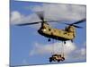 A U.S. Army CH-47 Chinook Helicopter Transports a Humvee-Stocktrek Images-Mounted Photographic Print
