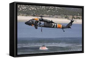 A U.S. Army Uh-60 Black Hawk Helicopter Collects Water from a Reservoir-null-Framed Stretched Canvas