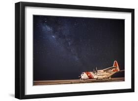 A U.S. Coast Guard C-130 Hercules Parked on the Tarmac on a Starry Night-null-Framed Photographic Print