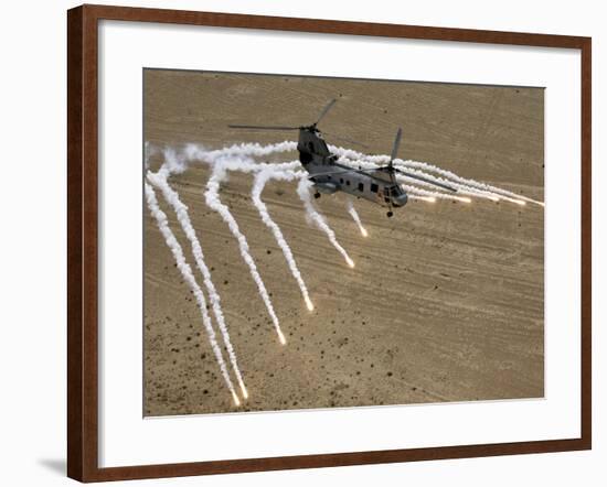 A U.S. Marine Corps CH-46 Sea Knight Helicopter Launching Flares Over the Desert Near Al Taqqadum-Stocktrek Images-Framed Photographic Print