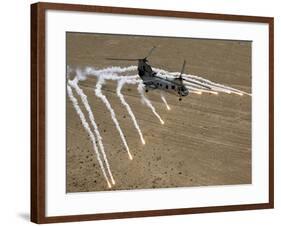 A U.S. Marine Corps CH-46 Sea Knight Helicopter Launching Flares Over the Desert Near Al Taqqadum-Stocktrek Images-Framed Photographic Print