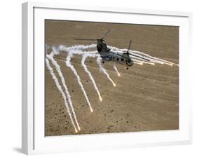 A U.S. Marine Corps CH-46 Sea Knight Helicopter Launching Flares Over the Desert Near Al Taqqadum-Stocktrek Images-Framed Photographic Print