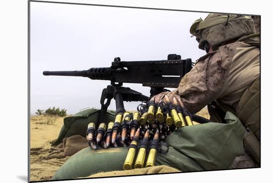 A U.S. Marine Fires an M2 .50 Caliber Machine Gun-null-Mounted Photographic Print