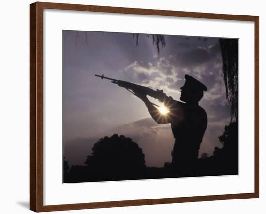A U.S. Marine Honor Guard Rifleman Performs a Gun Salute During Sunset-Stocktrek Images-Framed Photographic Print