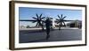 A U.S. Sailor Signals to a C-2A Greyhound Aircraft-null-Framed Photographic Print