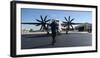 A U.S. Sailor Signals to a C-2A Greyhound Aircraft-null-Framed Photographic Print