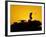 A U.S. Soldier Walks Atop His Armored Vehicle at Sunset-null-Framed Photographic Print