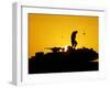 A U.S. Soldier Walks Atop His Armored Vehicle at Sunset-null-Framed Photographic Print