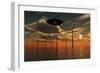 A Ufo Flying Above an Ocean Wind Farm at Sunset-Stocktrek Images-Framed Art Print