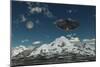 A Ufo Flying over a Mountain Range-Stocktrek Images-Mounted Art Print