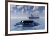 A Ufo Surfacing from Underwater and Following a Modern Day Freighter-null-Framed Art Print