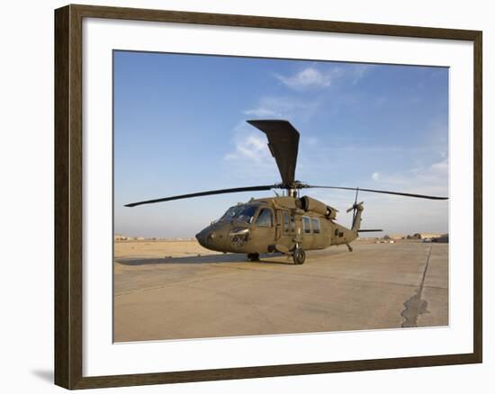 A UH-60 Black Hawk Helicopter at Camp Speicher, Iraq-null-Framed Photographic Print