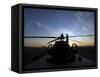 A UH-60 Black Hawk Helicopter on the Flight Line at Sunset-null-Framed Stretched Canvas
