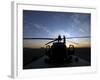 A UH-60 Black Hawk Helicopter on the Flight Line at Sunset-null-Framed Photographic Print