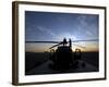 A UH-60 Black Hawk Helicopter on the Flight Line at Sunset-null-Framed Photographic Print