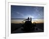 A UH-60 Black Hawk Helicopter on the Flight Line at Sunset-null-Framed Photographic Print