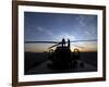 A UH-60 Black Hawk Helicopter on the Flight Line at Sunset-null-Framed Photographic Print