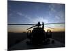 A UH-60 Black Hawk Helicopter on the Flight Line at Sunset-null-Mounted Photographic Print