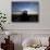 A UH-60 Black Hawk Helicopter on the Flight Line at Sunset-null-Photographic Print displayed on a wall