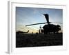 A UH-60 Black Hawk Helicopter on the Flight Line at Sunset-null-Framed Photographic Print