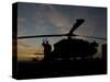 A UH-60 Black Hawk Helicopter on the Flight Line at Sunset-null-Stretched Canvas