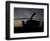 A UH-60 Black Hawk Helicopter on the Flight Line at Sunset-null-Framed Photographic Print