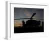 A UH-60 Black Hawk Helicopter on the Flight Line at Sunset-null-Framed Photographic Print