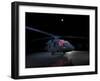 A UH-60 Black Hawk Helicopter Parked on the Flight Line under a Full Moon-null-Framed Premium Photographic Print