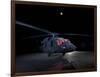 A UH-60 Black Hawk Helicopter Parked on the Flight Line under a Full Moon-null-Framed Photographic Print