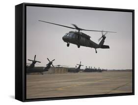 A UH-60 Black Hawk Taking Off for a Mission over Northern Iraq-null-Framed Stretched Canvas