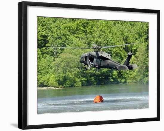 A UH-60 Blackhawk Helicopter Fills a Suspended Water Bucket in Marquette Lake, Pennsylvania-Stocktrek Images-Framed Photographic Print