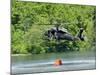 A UH-60 Blackhawk Helicopter Fills a Suspended Water Bucket in Marquette Lake, Pennsylvania-Stocktrek Images-Mounted Photographic Print