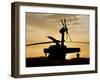 A UH-60L Black Hawk Helicopter Silhouetted by the Setting Sun-null-Framed Premium Photographic Print