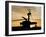 A UH-60L Black Hawk Helicopter Silhouetted by the Setting Sun-null-Framed Premium Photographic Print