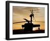 A UH-60L Black Hawk Helicopter Silhouetted by the Setting Sun-null-Framed Premium Photographic Print