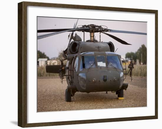 A UH-60L Black Hawk with Twin M240G Machine Guns at the Victory Base Complex in Baghdad, Iraq-null-Framed Photographic Print