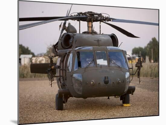 A UH-60L Black Hawk with Twin M240G Machine Guns at the Victory Base Complex in Baghdad, Iraq-null-Mounted Photographic Print