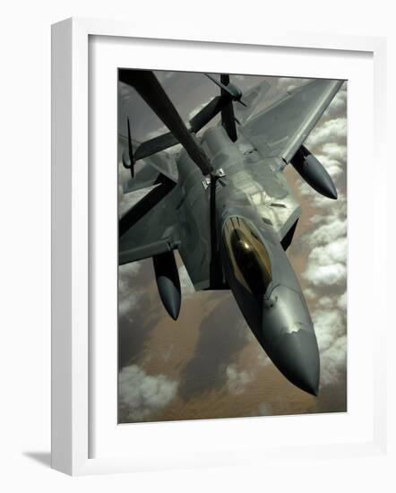 A US Air Force F-22 Raptor Is Refueled by a Kc-10A Extender Aircraft over Southwest Asia-null-Framed Photographic Print