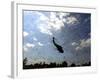 A US Navy Hh-60 Seahawk Stirs Up Debris While Taking Off-null-Framed Photographic Print