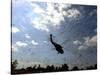 A US Navy Hh-60 Seahawk Stirs Up Debris While Taking Off-null-Stretched Canvas