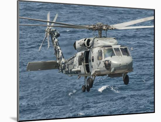 A US Navy SH-60F Seahawk Flying Off the Coast of Pakistan-Stocktrek Images-Mounted Photographic Print
