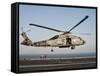 A US Navy SH-60F Seahawk Hovers Above the Flight Deck of USS Eisenhower-Stocktrek Images-Framed Stretched Canvas