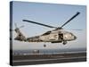 A US Navy SH-60F Seahawk Hovers Above the Flight Deck of USS Eisenhower-Stocktrek Images-Stretched Canvas