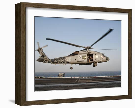 A US Navy SH-60F Seahawk Hovers Above the Flight Deck of USS Eisenhower-Stocktrek Images-Framed Photographic Print