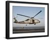 A US Navy SH-60F Seahawk Hovers Above the Flight Deck of USS Eisenhower-Stocktrek Images-Framed Photographic Print