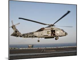 A US Navy SH-60F Seahawk Hovers Above the Flight Deck of USS Eisenhower-Stocktrek Images-Mounted Photographic Print