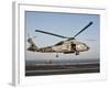 A US Navy SH-60F Seahawk Hovers Above the Flight Deck of USS Eisenhower-Stocktrek Images-Framed Photographic Print