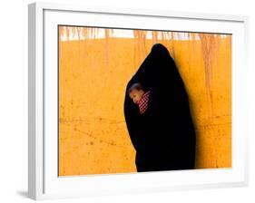 A Veiled Woman Carries Her Child Through the Streets of Erfoud-null-Framed Photographic Print