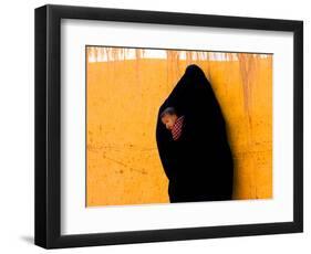 A Veiled Woman Carries Her Child Through the Streets of Erfoud-null-Framed Photographic Print